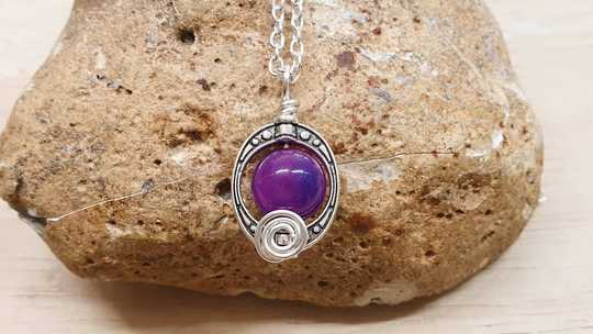 Rare purple Sugilite pendant