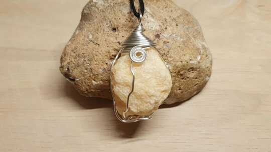 Raw calcite pendant