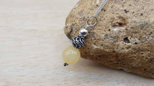 Small yellow calcite pendant