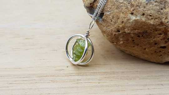 Peridot circle pendant 