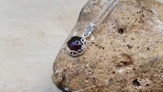 Tiny round Garnet pendant