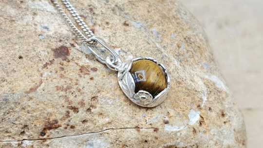 Tiny Tigers eye pendant