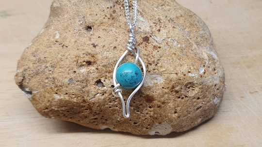 Turquoise wire leaf pendant